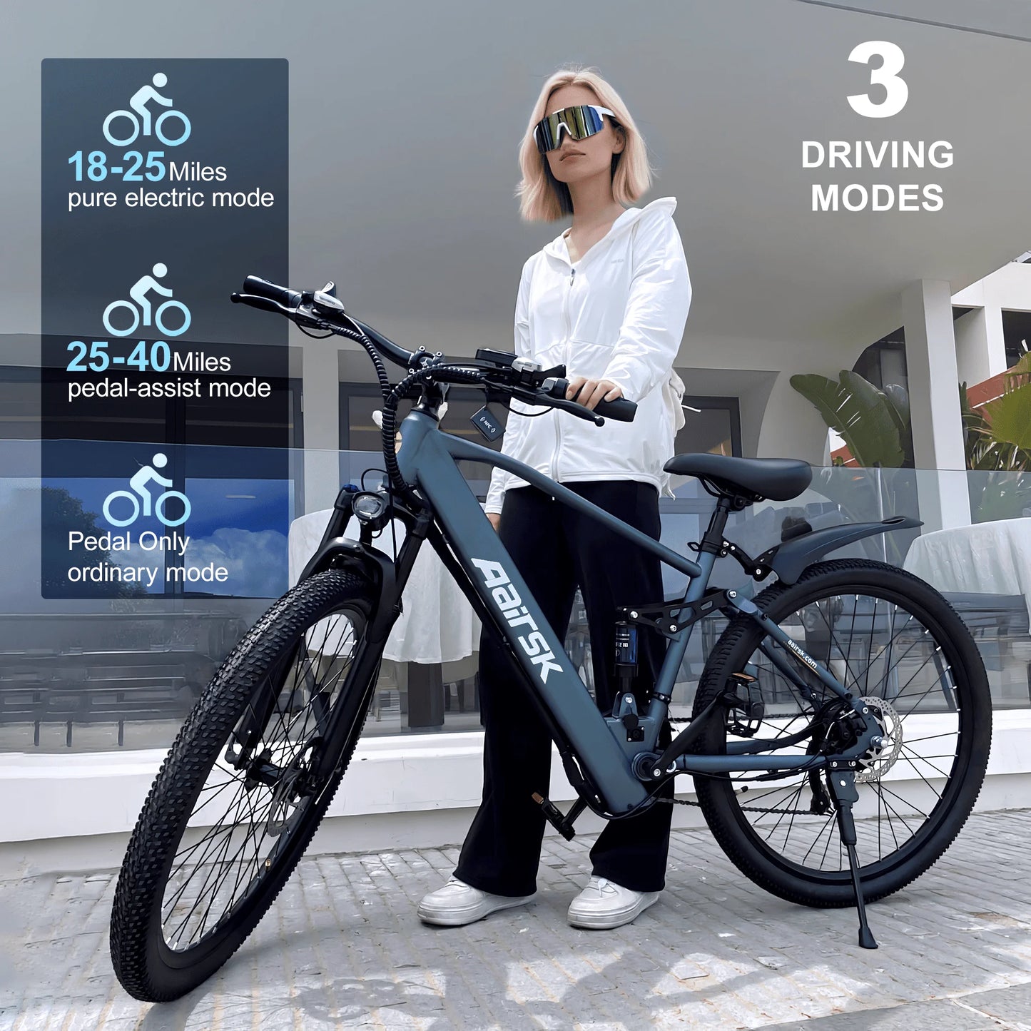 Woman holding a PeiYue electric bike with mode indicators on a modern building background