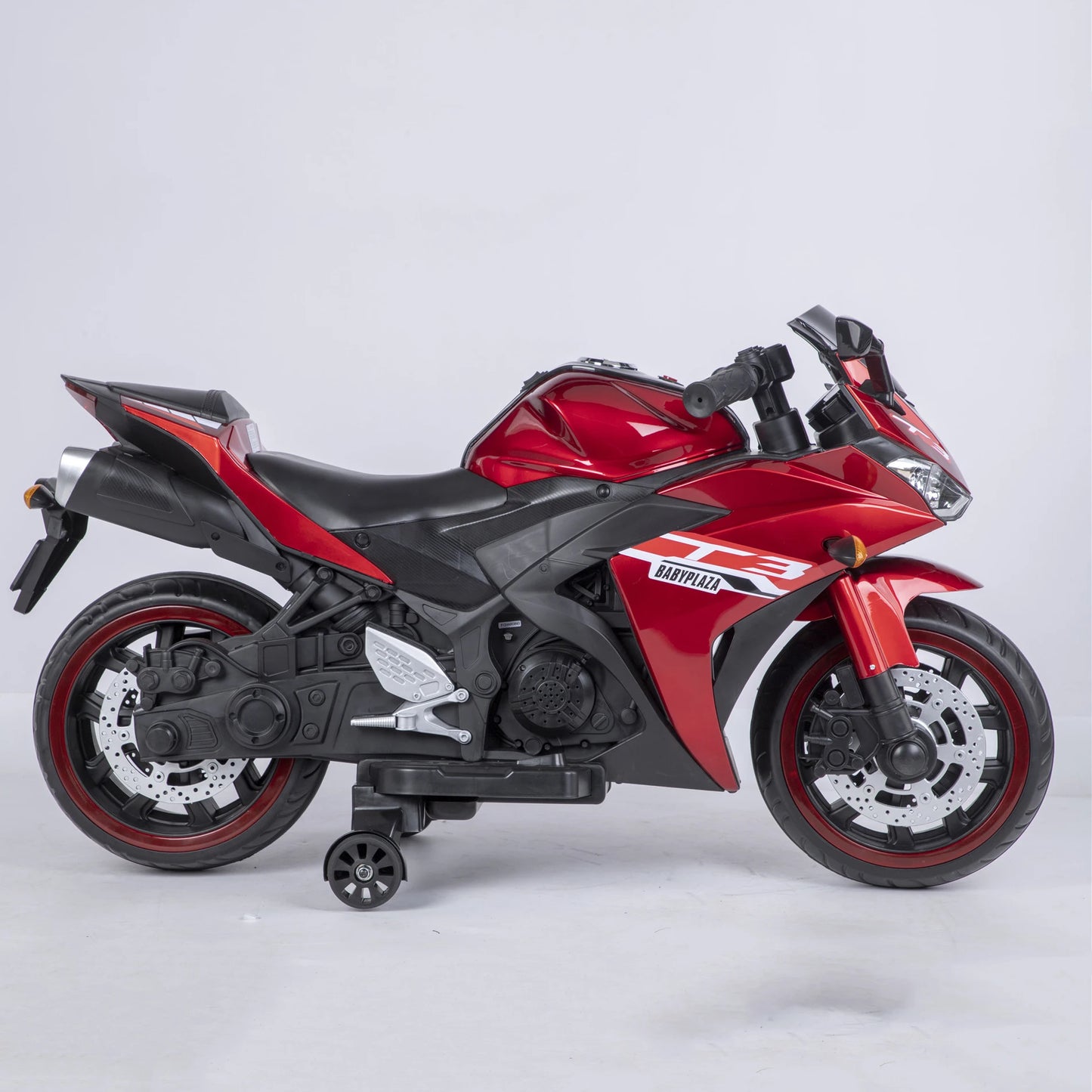 Red and black motorcycle model on a white background