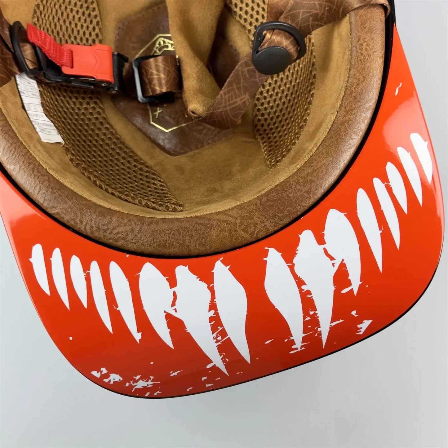 Stylish retro half-face motorcycle helmet on display.